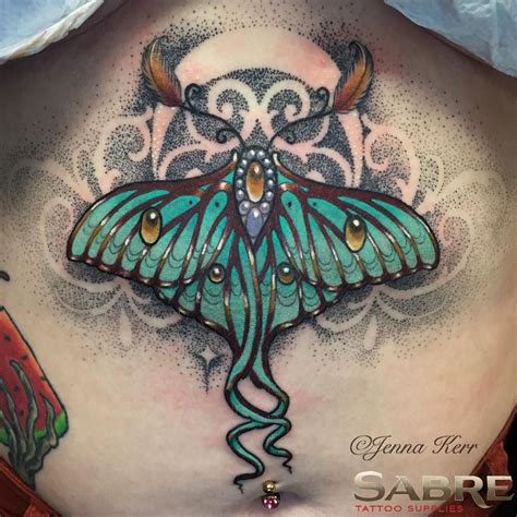 moth under breast tattoo|Unique Moth Tattoo Underbust Designs